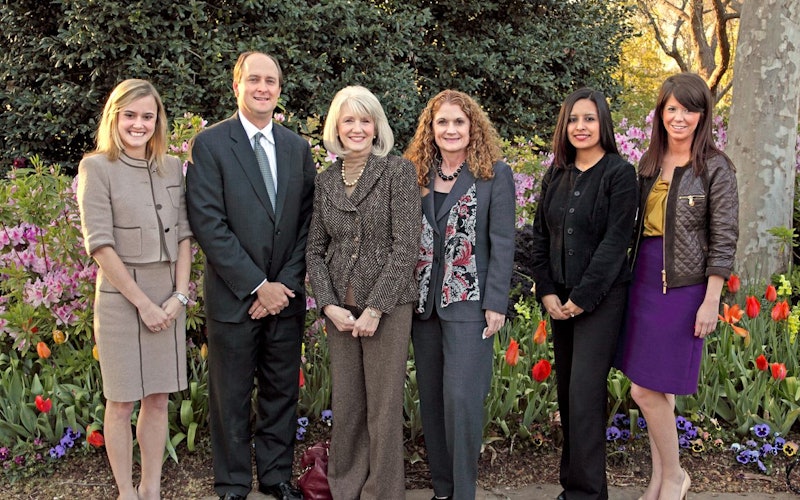 Group photo of corporate sponsors in professional attire