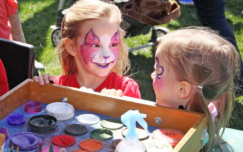 Children with butterfly face paint