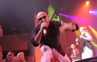 Emerald City singer on stage