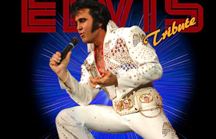Kraig Parker dressed as Elvis singing