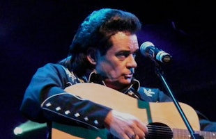 Phillip Bauer dressed and performing as jonny cash